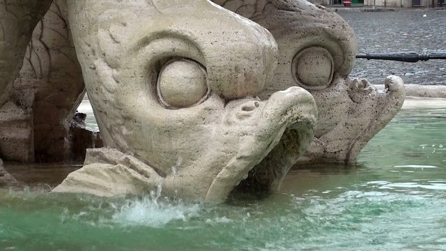 Dolphin heads of Triton Fountain (Fontana del Tritone). Rome