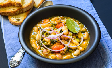 Soup with vegetables,beans, tuscan soup, ribollita.