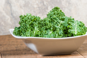 Fototapeta premium Bowl of chopped curly kale