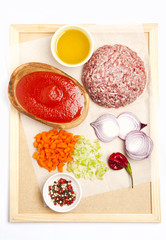 ingredients for make ragu bolognese: mince meat , tomato sauce,