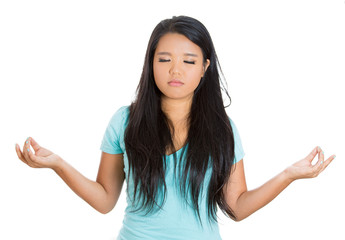 Fototapeta premium Young woman meditating in zen mode relaxing taking easy 