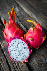 Asian Dragon fruit on the wooden background