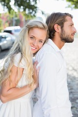 Attractive couple hugging each other