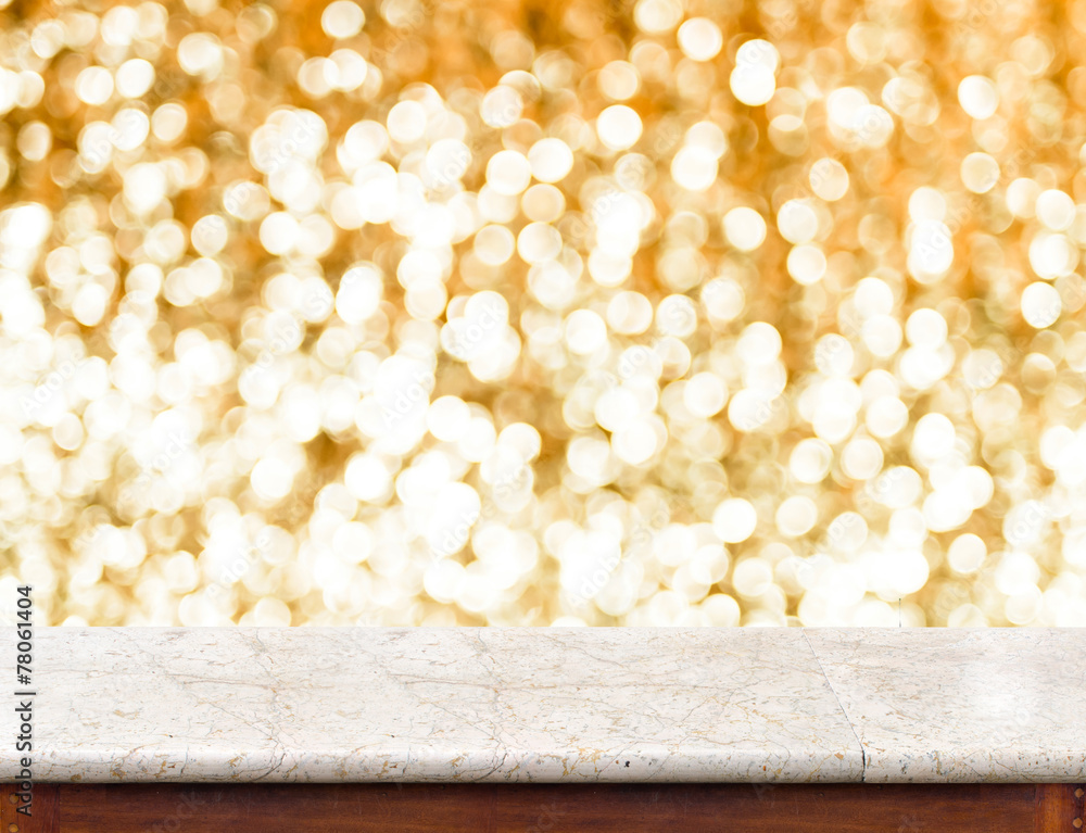 Fototapete marble table with bokeh golden sparkling background,empty room f