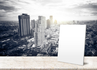 Paper poster at Frosted glass with Landscape View of City Skylin