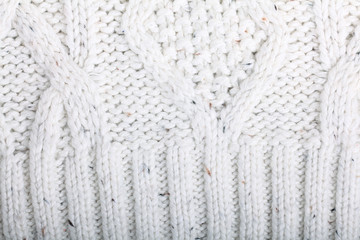 texture of white wool knit sweater homemade