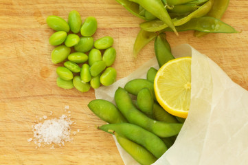 Edamame, soy beans on a wooden background
