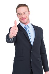 Positive businessman smiling with thumb up