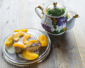 Sweet cake with condensed milk and peaches