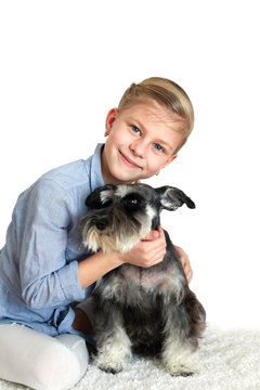 Happy person and her faithful dog over white background