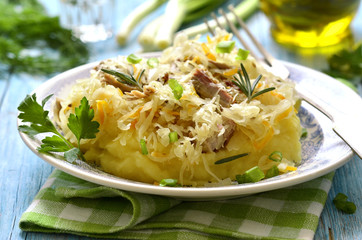 Potato puree garnished with stewed sour cabbage,traditional germ