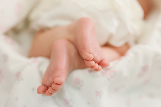 The heel of the foot of a small three months sleeping child