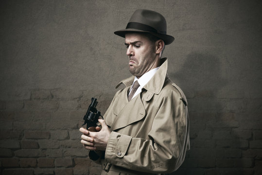 Silly vintage detective with a gun