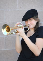 Female trumpet player.
