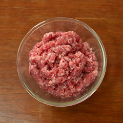 minced pork on wood table