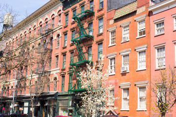 Obraz premium Old houses with stairs in the historic district of West Village