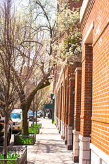 Old houses with stairs in the historic district of West Village