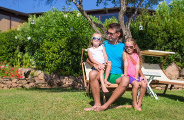Father and kids at tropical beach vacation outdoor