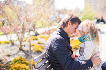 Adorable little girl and dad enjoy sunny day on New York's High