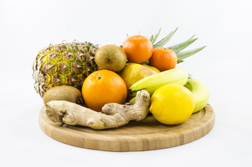 Fruits composition on wooden board.