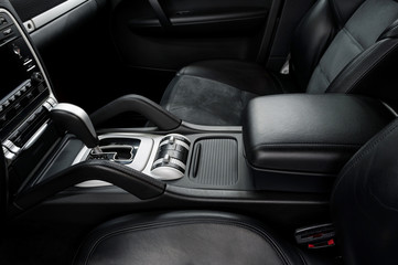Automatic transmission gear shift. Modern car interior detail.