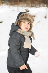 Beauty toddler boy in the snow