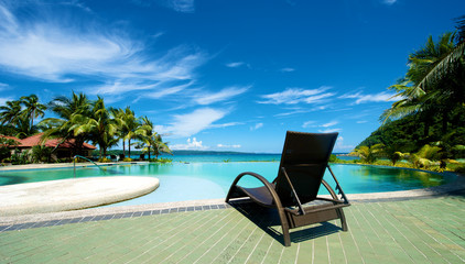Swimming pool vacation resort with recliner in Boracay