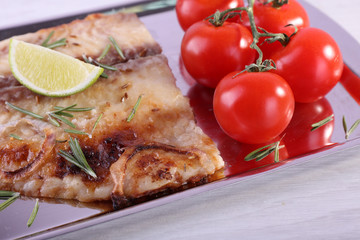 Dish of Pangasius fillet with rosemary and lime