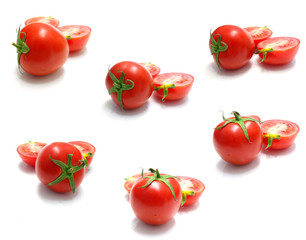 tomato and slices of tomato on white background