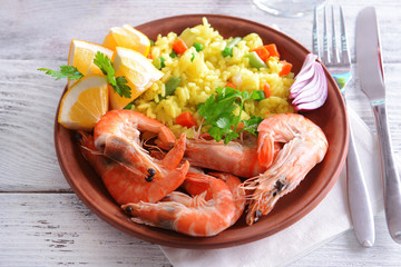 Seafood Paella on plate on table close-up