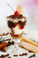 Tasty tiramisu dessert in glass,