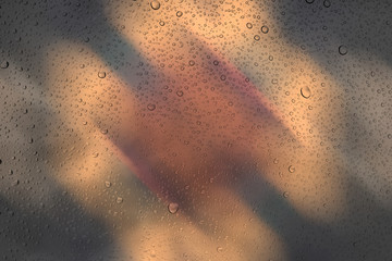 Drops of water on glass and abstract Background with bokeh,defoc