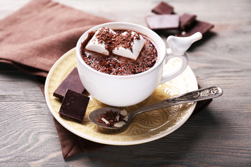 Hot chocolate with marshmallows in mug,