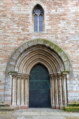 Fototapeta na wymiar Ancient metal entrance to catholic church