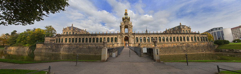 Fototapeta na wymiar Dresden Zwinger palace panorama with channel and park