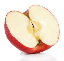 Cut red apple isolated on white