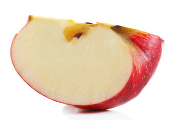 Cut red apple isolated on white