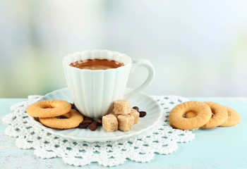 Cup of coffee and tasty cookies