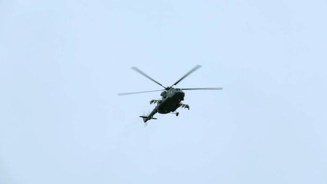 One helicopter flying in the sky during military parade