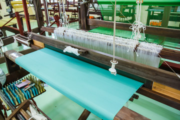 Loom for weaving silk in Thailand.