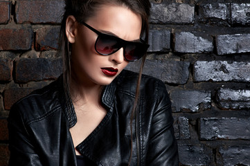 Beautiful girl in fashionable clothes.