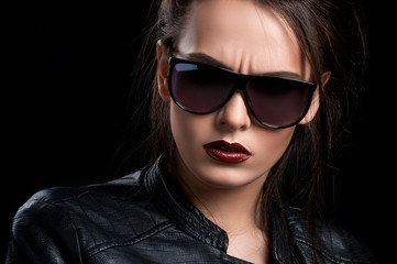 Beautiful girl in fashionable clothes.