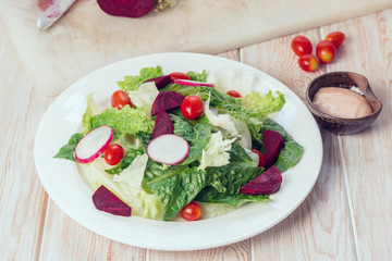 Fresh salad with tomatoes and beetroot