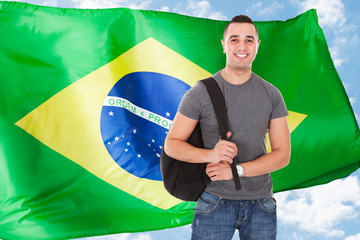 Portrait Of Happy Male Student With Bag