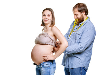 young family waiting for baby on a white background