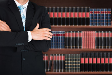 Close-up Of Male Lawyer With Arm Crossed