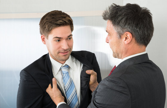 Two Businessman Fighting