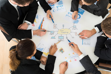 Businesspeople Discussing Cloud Computing