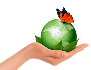 Green world with leaf and butterfly in woman hand. Vector illust