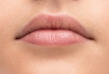 Fototapeta premium Beautiful woman's lips close-up